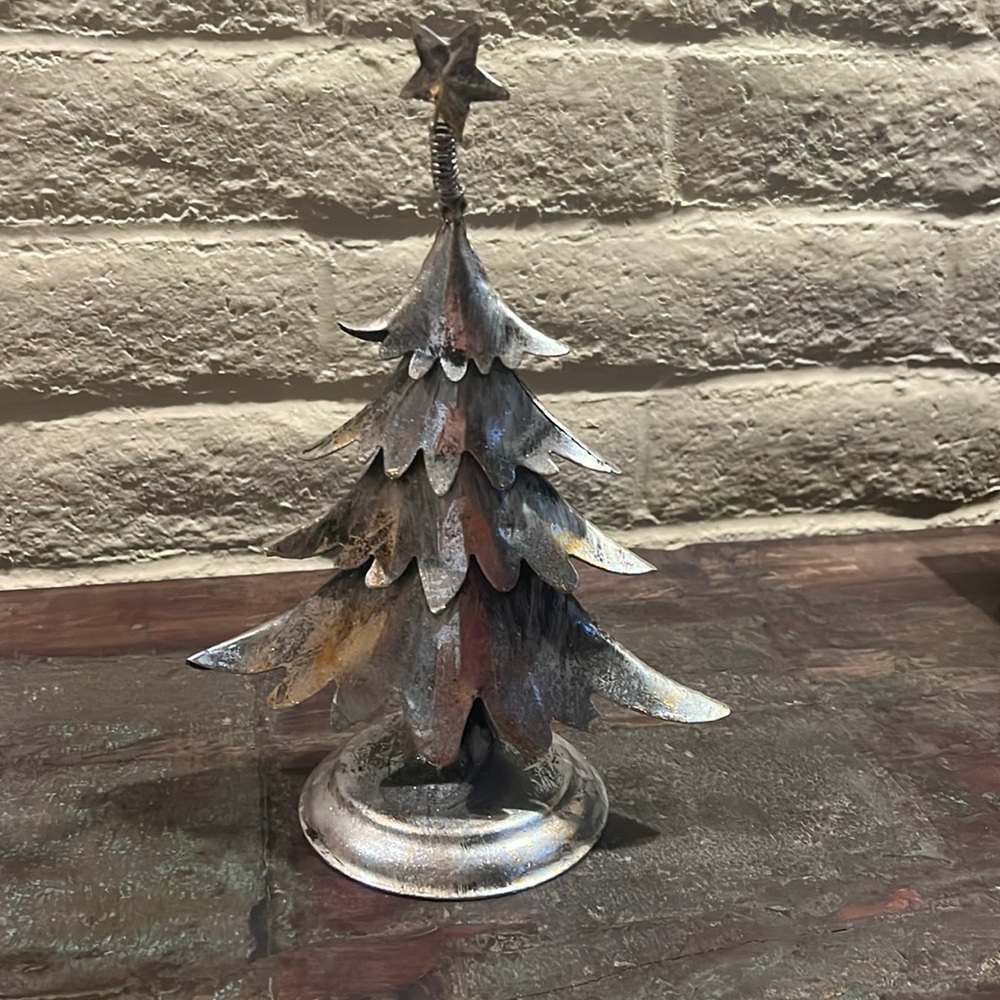 Silver metal Christmas Tree with star. Table decor. Stands about 11 inches high.